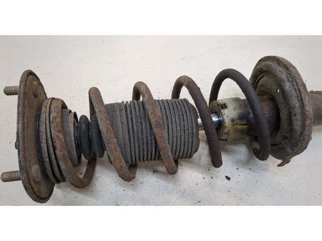 Стойка амортизатора Mitsubishi Colt 2004-2008