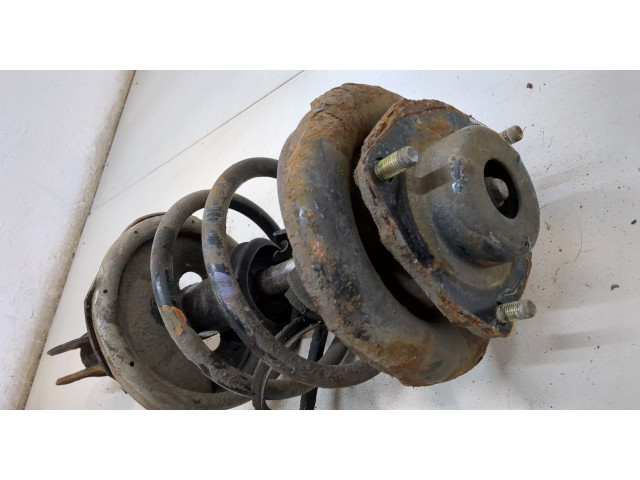 Стойка амортизатора  Nissan X-Trail (T30) 2001-2007 54303EQ025, 54010EQ02B     