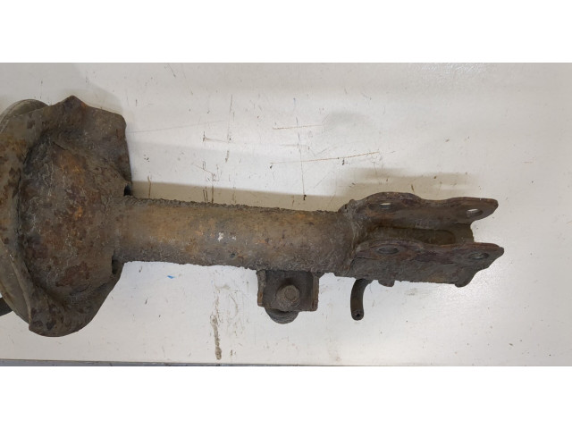 Стойка амортизатора  Nissan X-Trail (T30) 2001-2006      