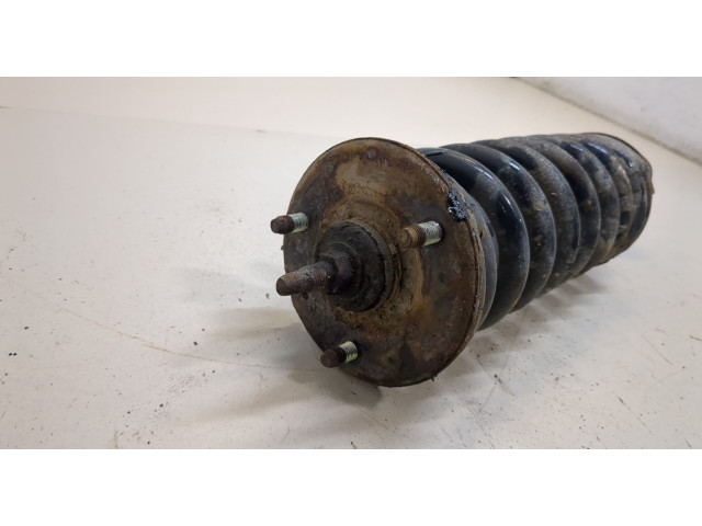 Стойка амортизатора Nissan Pathfinder 2004-2014