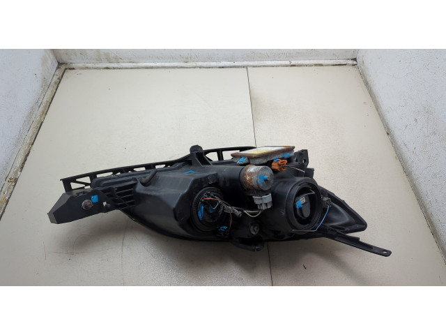 Фара передняя Mazda 3 (BK) 2003-2009 левая