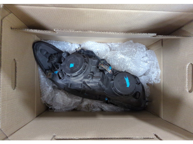 Фара передняя  Jaguar XF 2007–2012 левая 