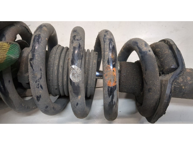 Стойка амортизатора Mitsubishi Pajero / Montero 2000-2006