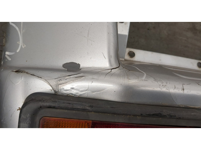 Бампер Mitsubishi Pajero Pinin задний