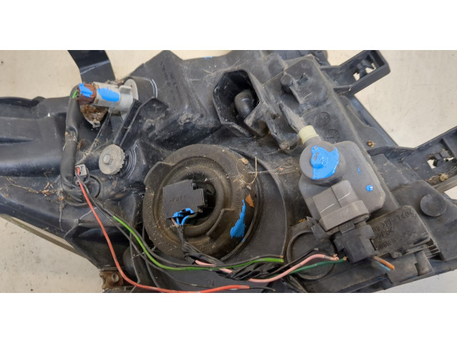 Фара передняя Nissan Pathfinder 2004-2014 левая