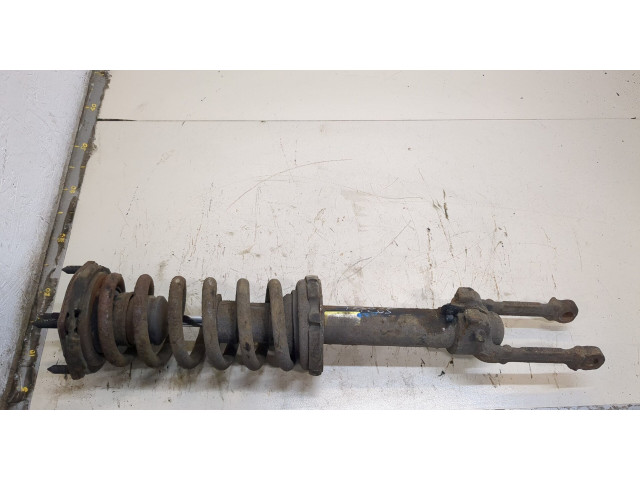 Стойка амортизатора  Jeep Commander 2006-2010      