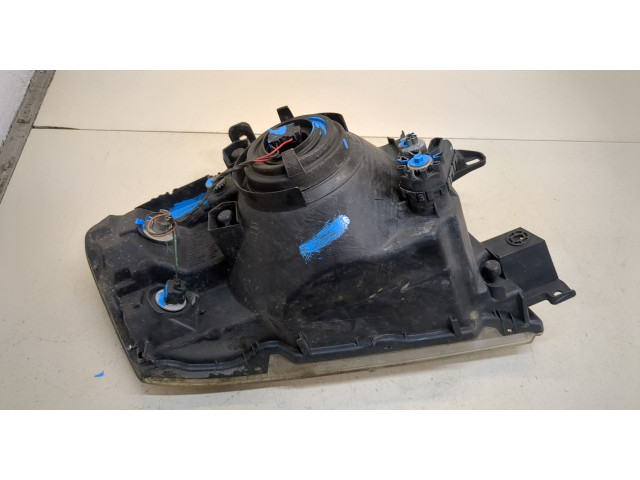 Фара передняя Mitsubishi Pajero / Montero 2000-2006 левая