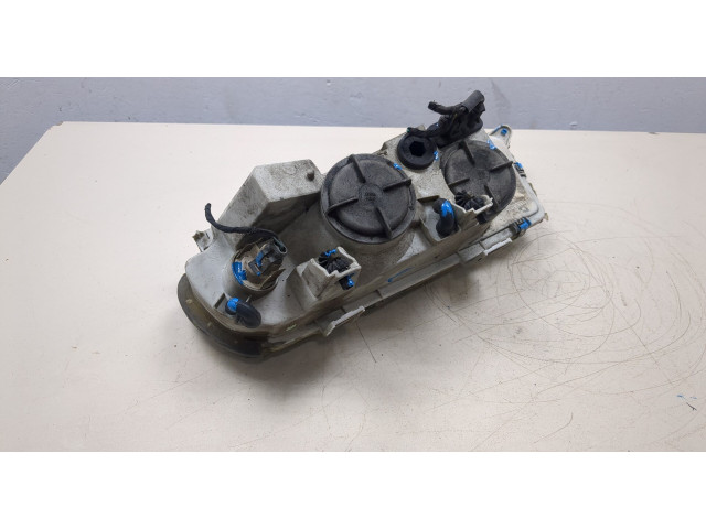 Фара передняя  Lancia Kappa правая 