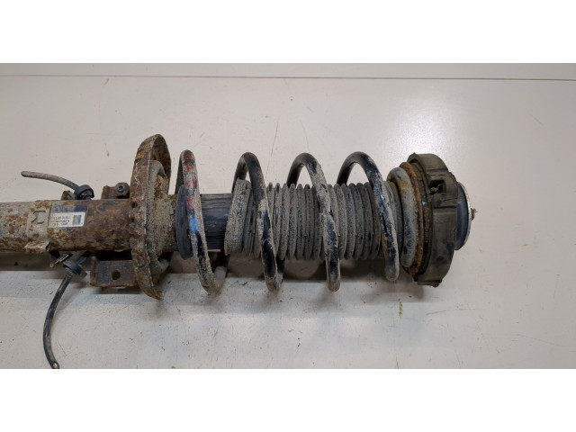 Стойка амортизатора  Skoda Fabia 2007-2010      