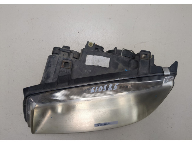 Фара передняя  Volkswagen Bora левая 