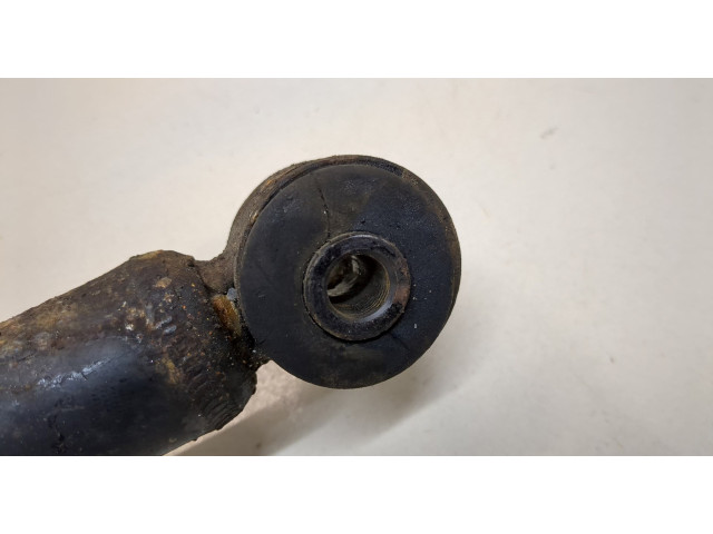 Стойка амортизатора Mitsubishi Outlander 2003-2009