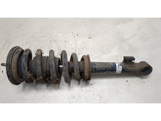 Стойка амортизатора Mitsubishi L200 2006-2015