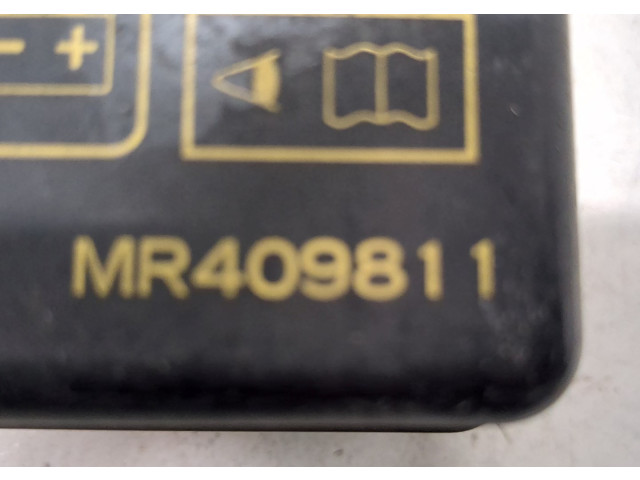 Крышка блока предохранителей  Mitsubishi Montero Sport / Pajero Sport 1996-2008      MR409811   