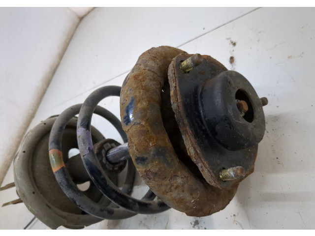 Стойка амортизатора  Nissan X-Trail (T30) 2001-2007      