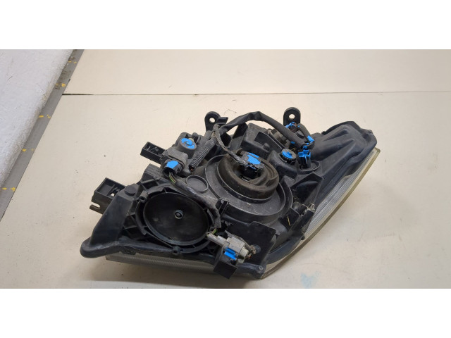 Фара передняя Nissan Pathfinder 2004-2014 правая