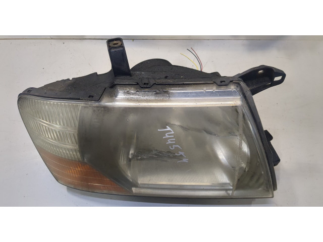Фара передняя Mitsubishi Pajero / Montero 2000-2006 правая