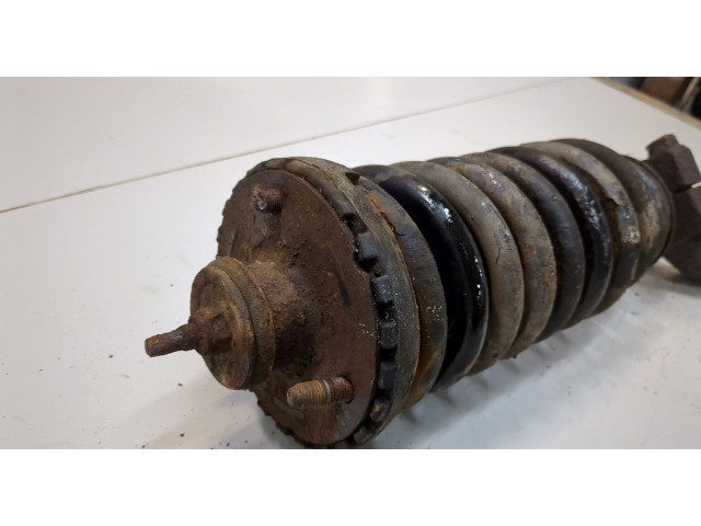 Стойка амортизатора  SsangYong Rexton 2007-2012      