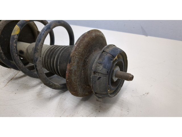 Стойка амортизатора Dacia Logan 2004-2012