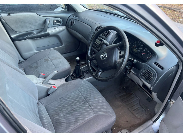 Задний фонарь Mazda 323 (BJ) 1998-2003