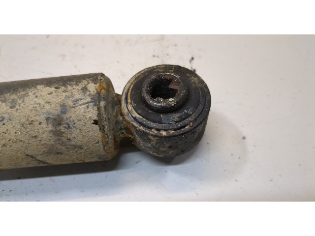 Стойка амортизатора  Suzuki Jimny 1998-2012      