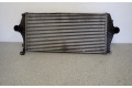 Радиатор интеркулера    KIA Carens II