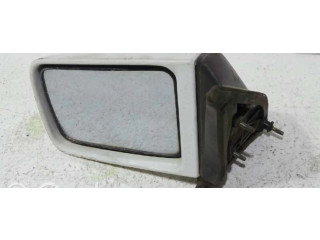 Зеркало электрическое левое Mitsubishi Colt 1989-1992 года