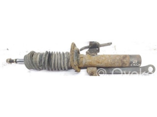 Передний амортизатор