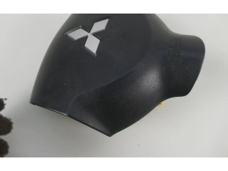 Подушка безопасности водителя 7030A088XA Mitsubishi Outlander