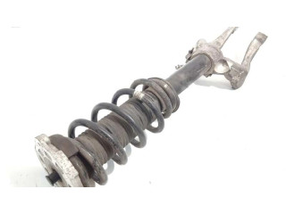 Передний амортизатор с пружиной      