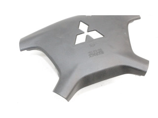 Подушка безопасности водителя 7030A099 Mitsubishi Pajero