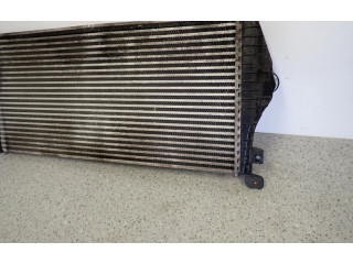 Радиатор интеркулера    KIA Carens II