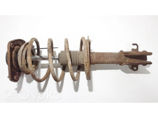 Передний амортизатор