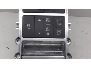 Включатель регулировки высоты / жесткости ходовой части