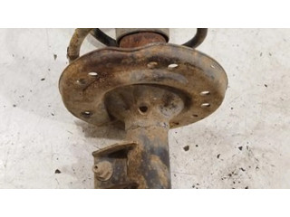 Передний амортизатор с пружиной      