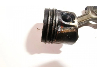 Píst 23502643 Opel Combo C