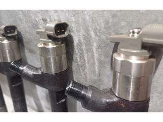 Vstřikovač 55578075 Opel Astra J