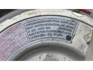 Подушка безопасности водителя BC5A57K00, T93013A Mazda 323