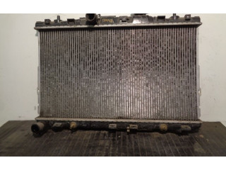 Радиатор охлаждающей жидкости    253102D000, 67494   Hyundai Coupe