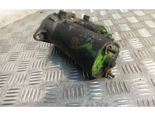 Стартер 0001110115 Opel Astra F