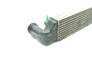 Интеркулер  1787779, 77897930   BMW X3 E83 