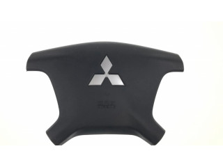 Подушка безопасности водителя 7030A099, G46017733 Mitsubishi Pajero