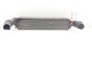 Интеркулер 77897930 BMW X3 E83