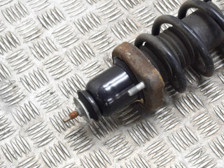 Передний амортизатор