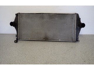 Радиатор интеркулера    KIA Carens II