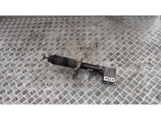 Передний амортизатор