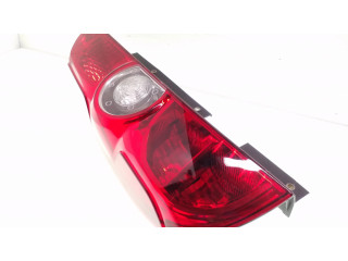 Задний фонарь левый 00518106740 Fiat Doblo 2010-2022 года