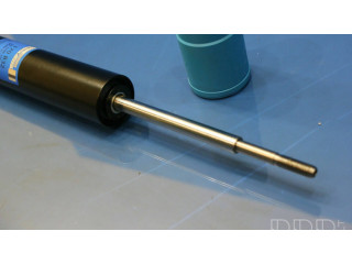 Передний амортизатор