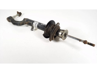 Передний амортизатор