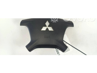 Подушка безопасности водителя 7030A099 Mitsubishi Pajero