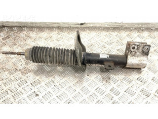 Передний амортизатор